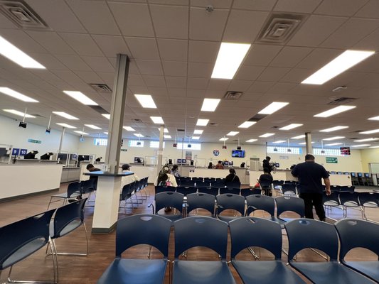 Waiting area and view of half the stations where representatives pleasantly await you