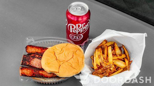 Smoked sausage sandwich combo with fries and a drink