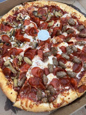 Pepperoni, sausage, and mushroom pizza.