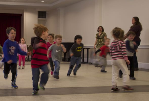 The large auditorium room is perfect for playing indoors on a rainy day.