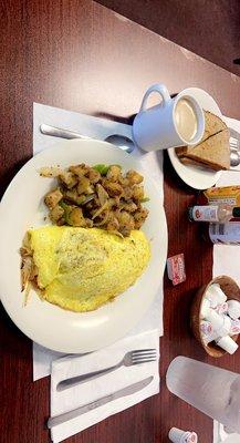 Hog omelette with cowboy potatoes.