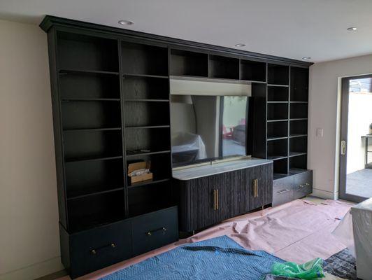 Red oak black stained entertainment center