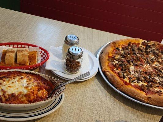 XL 3 topping pizza, lasagna,  garlic bread, two cokes for $45.