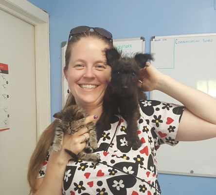 Elizabeth, the owner, and a couple of her foster animals