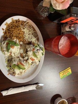 Sopes, chicken, pastor (pork), and carne asada (steak) with a side of rice and beans. With a horchata to wash everything down :)