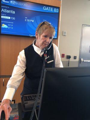 Mrs. Sharon W. Working the phone and the computer. Very helpful.