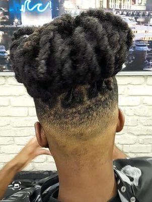 Back veiw of mid Bald fade