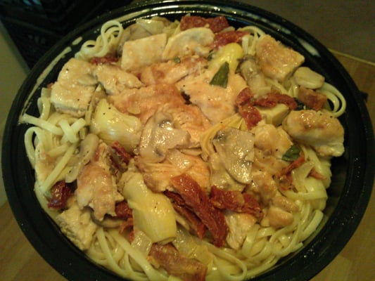 Feasta chicken (chicken with marsala sauce, artichoke hearts, sun-dried tomatoes and mushroom, over linguini pasta).