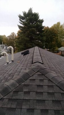 Removed all existing roof boards and roof joists.  Frame new roof, install new plywood and install new roof system in Watertown, MA.