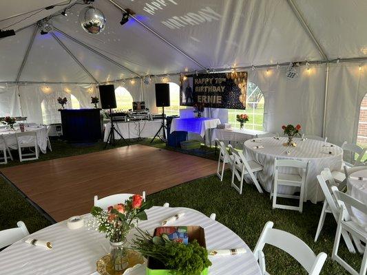 Birthday celebration 12x12 dance floor with bars and 2 20x40 tents together to create 1600 square feet of space for 112 people