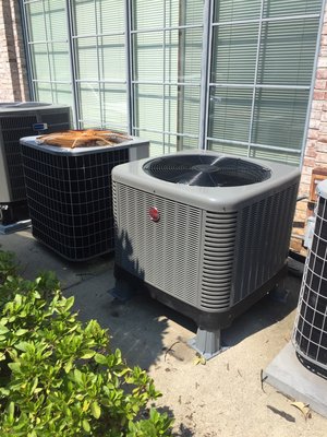 Installation of a new Rheem heat pump unit.