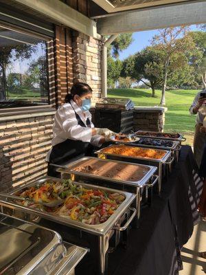 Angelica serves the food.