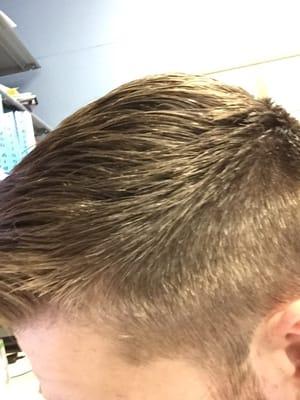 Clean and excellent fade, styled well.