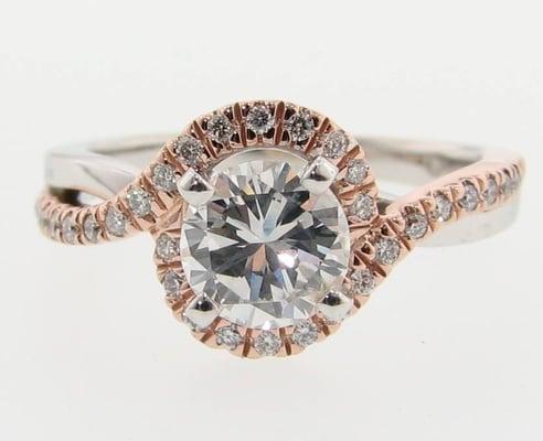 An engagement ring for a young lady in white and pink rose gold.