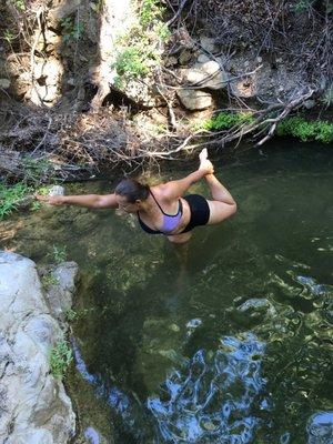 Yoga in middle of the wilderness and in water.