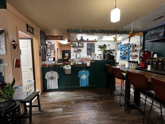 The main cashier area where you can find a selection of baked goods, flavored syrups, the menu.