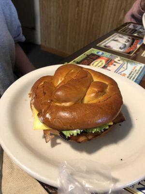 Bacon, lettuce & cheese on a pretzel bun for breakfast.  Delicious...!