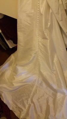 My husband picked up the dress  and took it directly to the venue in a standard wedding dress garment bag.