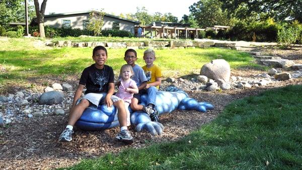 Children enjoying nature playscape. Photo by Glenn P. Knoblock.