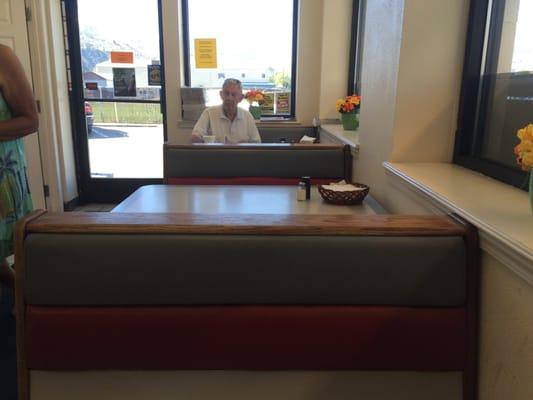 Spacious main dining floor with comfortable booths.