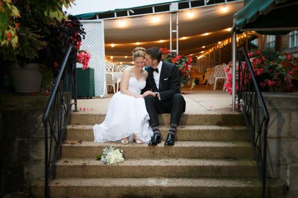 Bride and groom on steps at the DuPont Country Club