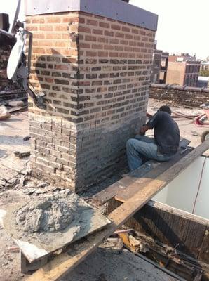 Chimney masonry restored on all 4-sides.