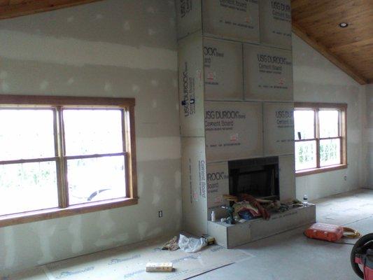 These are progress photos taken during the building of a large great room addition in an existing home.