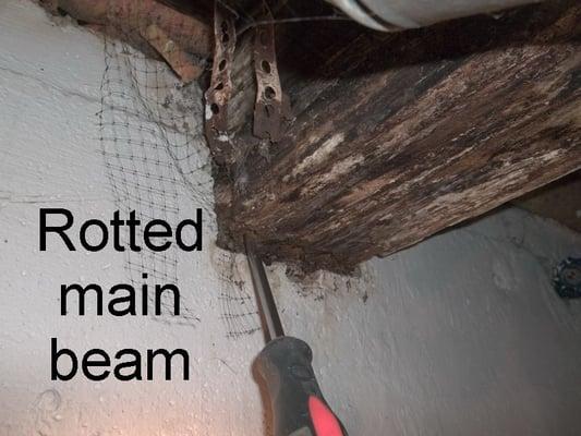 A damaged main support beam needs repair