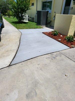 After new solid concrete that fits well within our weird shaped driveway.