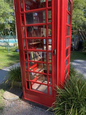 Telephone booth with a book exchange inside