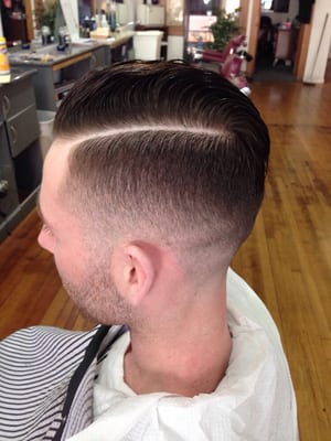 Tight fade w/part.