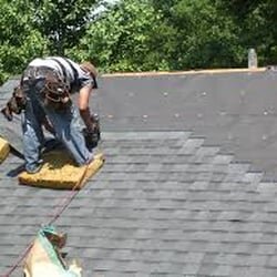 One of my guys installing GAF shingles.