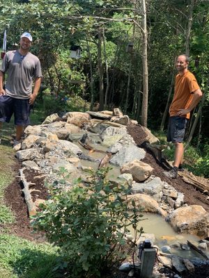 James ( owner) & Todd (contraction) of Hydrozen Waterscapes finishing my pond free waterfall.. I highly recommend them.