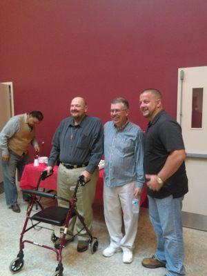 From left to right: visiting pastor John, retiring pastor Dennis, and incoming pastor Logan.