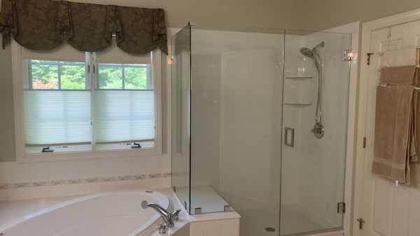 After... 2-1 Delta shower head, 2 corner shelves, the shower seat was cut to one level, the shower feels larger.