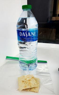 Bottled Water and Saltine crackers provided to cleanse the palate in between different tastings.