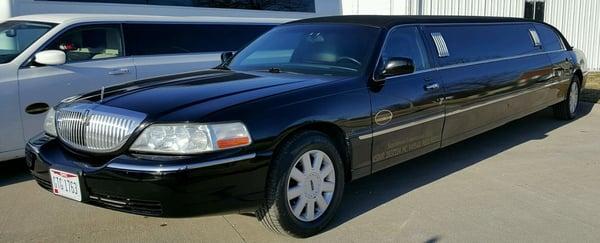 Our Lincoln Town Car limousine with 5th door. (Black, seats up to 10) *Ideal for 8 passengers or less*