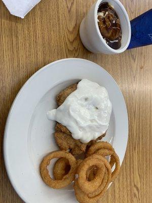 Country Fried Steak with mashed potatoes & upgraded to onion rings for an additional charge