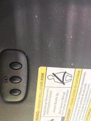 It appeared something was sprayed inside the vehicle. This is on the drivers side visor.