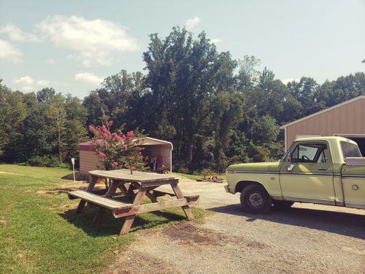 Outdoor picnic table to eat at.