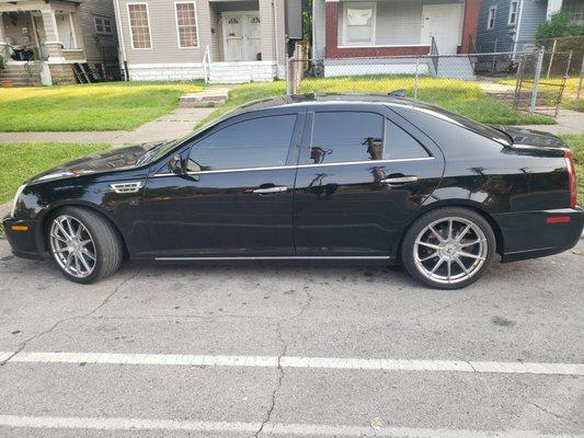 Black 2011 Cadillac STS air conditioning, heated seats front and rear.20in. chrome wheels runs great excellent for travel. The condition of