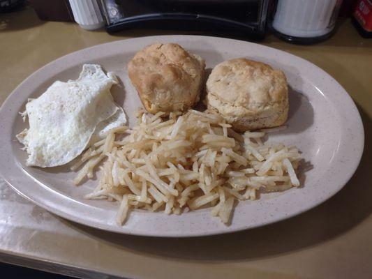 Egg over easy, hash browns, biscuits