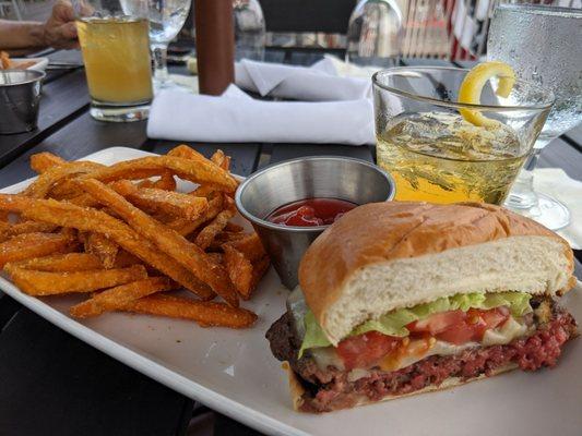 Patio post-golf: farm burger, sweet potato fries, and a rusty nail. Parfait.