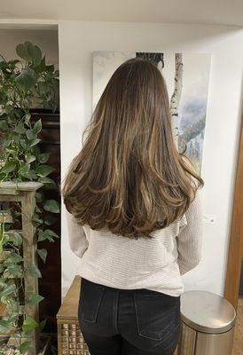 Beautify a grown out blonde with splashes of chocolate and cinnamon to captivate the depth of a stunningly nautral sun kissed brunette!