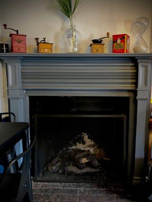 One of two charming fireplaces.