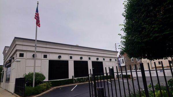 West side of bldg - Entrance to parking lot and drive-thru/ATM