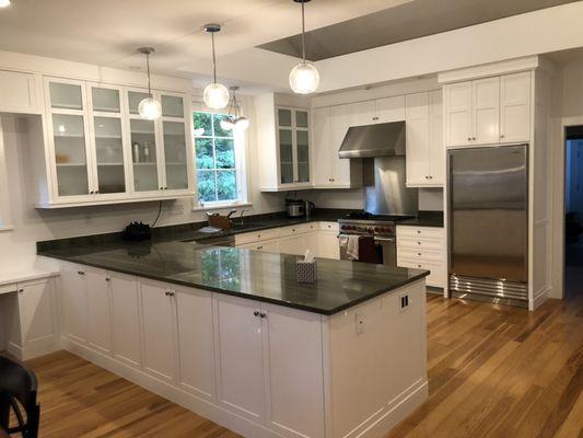 Lexington, we changed from a dark wood to a beautiful bright white finish on all the cabinets