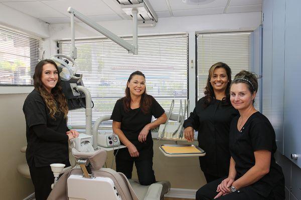 Lending a helping hand everyday are dental assistants (from left to right): Eileen, Leilani, Reina and Lacy.