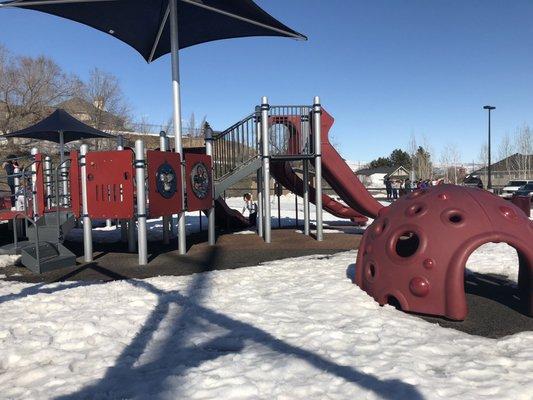 Some of the playground equipment & a shade cover.