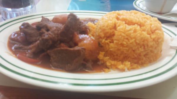 stewed beef, yellow rice, and beans